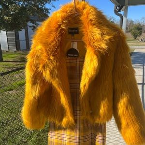 Medium faux fur coat! Never been worn